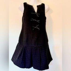 FREE PEOPLE black mini dress with foux leather trim and bows, size 0 (as is)